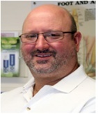 Howard Schultheiss Jr., D.P.M.