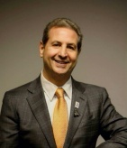 Leonard Brenner, D.M.D., F.A.G.D.