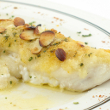 Almond lemon crusted fish with spinach