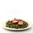 Braised kale with bacon and cider