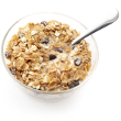 Quinoa oatmeal with banana, raisins, and pistachios
