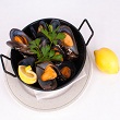 Steamed mussels in tomato broth
